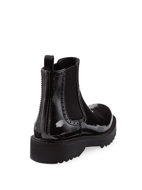 prada patent leather chelsea boots.